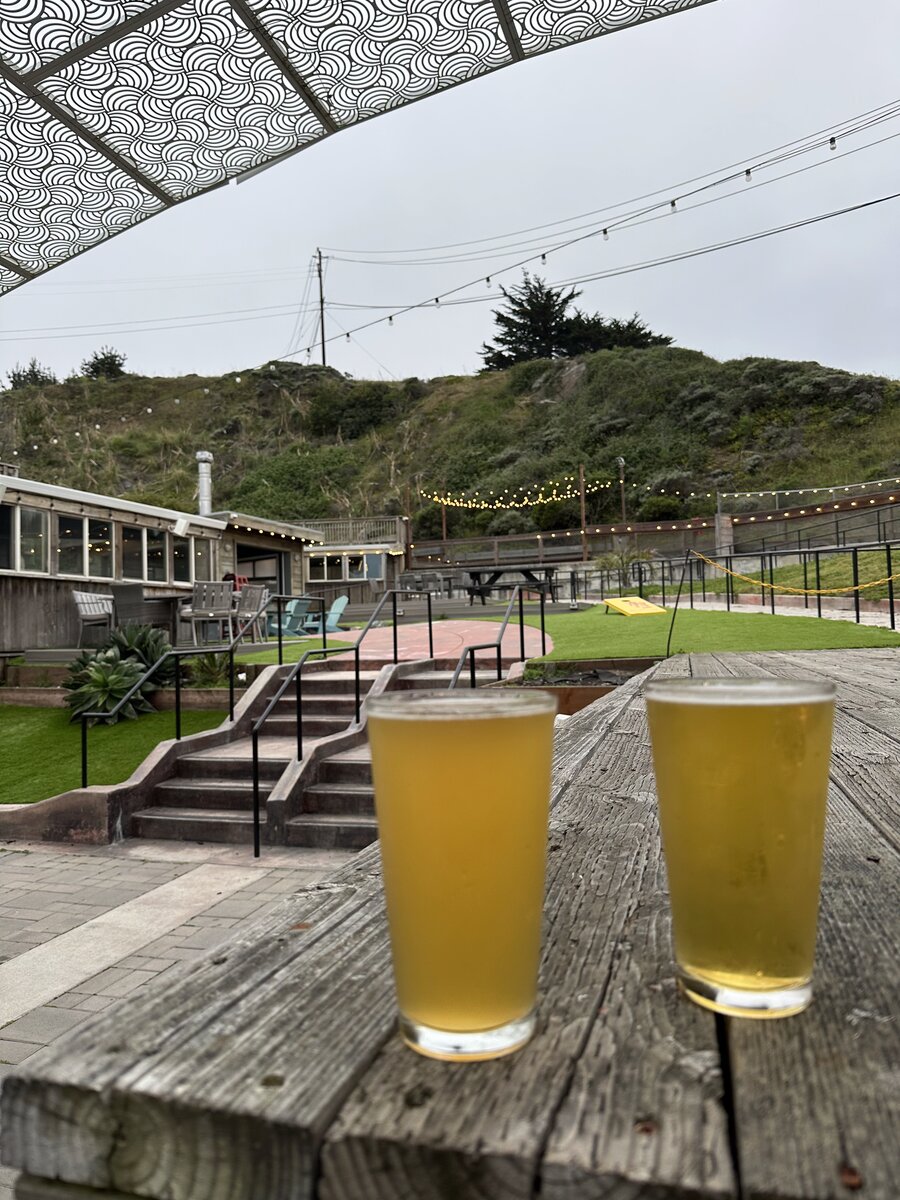 Two beers on a picnic table in the beer garden