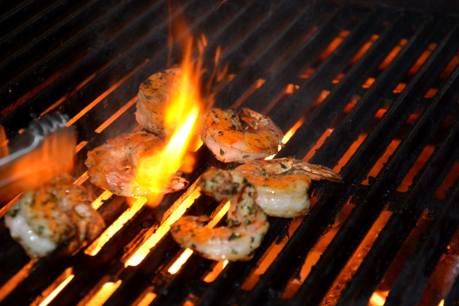 Prawns on the grill over open flame