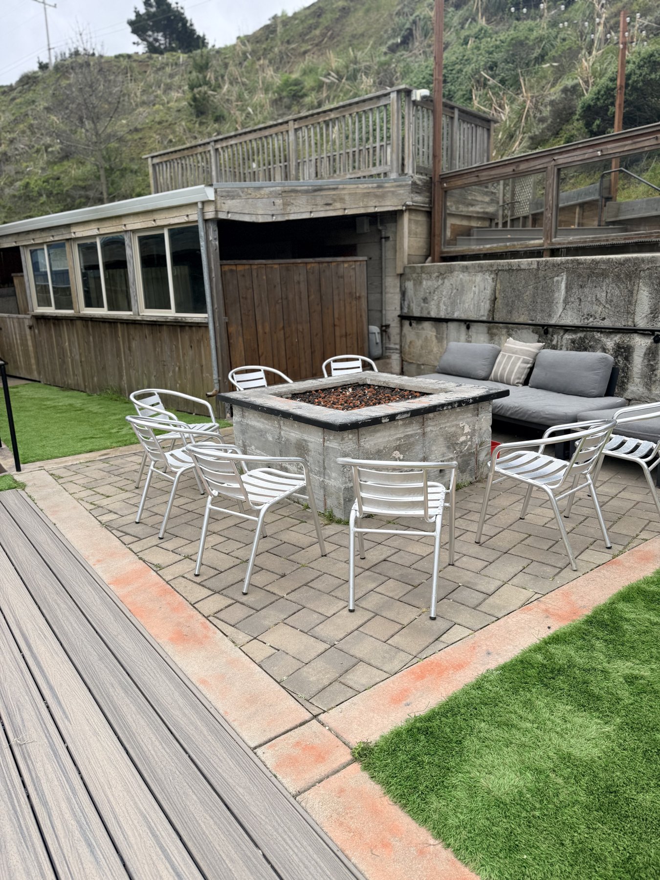 Outdoor deck with fire tables and lounge seating